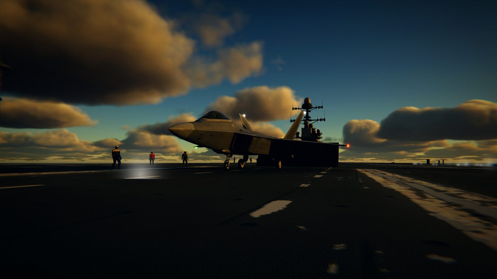 An F-22 on an aircraft carrier deck at dusk, deck crew walking past.